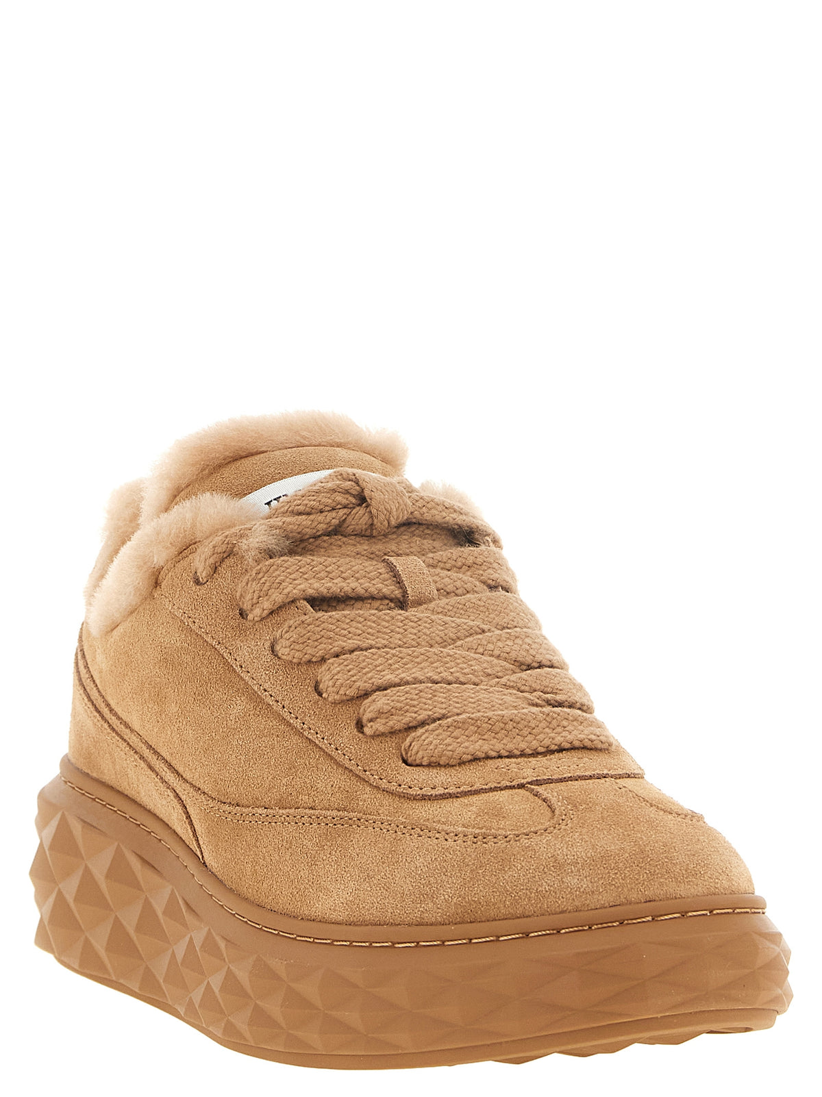 Elevate your style with Jimmy Choo's Diamond Maxi Retro sneakers, crafted from luxurious beige suede and plush shearling, embodying bold sophistication and timeless elegance.