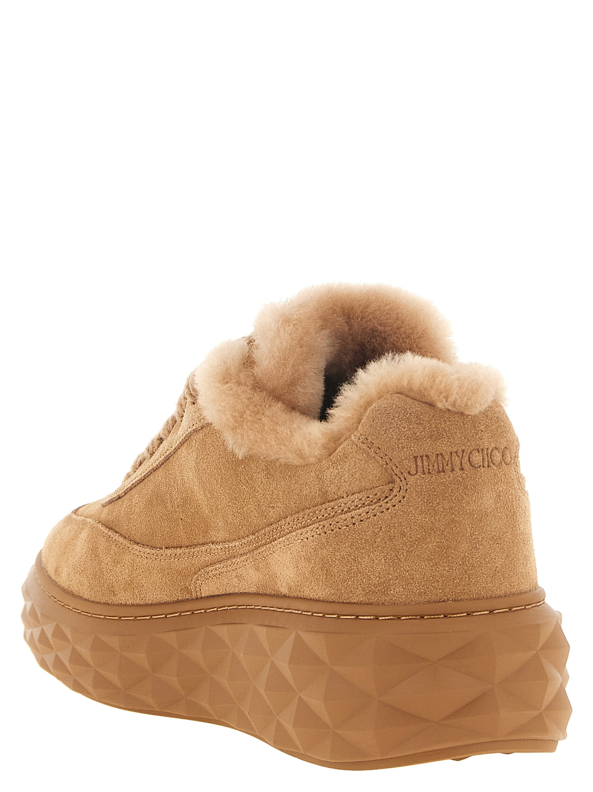 Elevate your style with Jimmy Choo's Diamond Maxi Retro sneakers, crafted from sumptuous beige suede and plush shearling, embodying luxury and contemporary elegance.