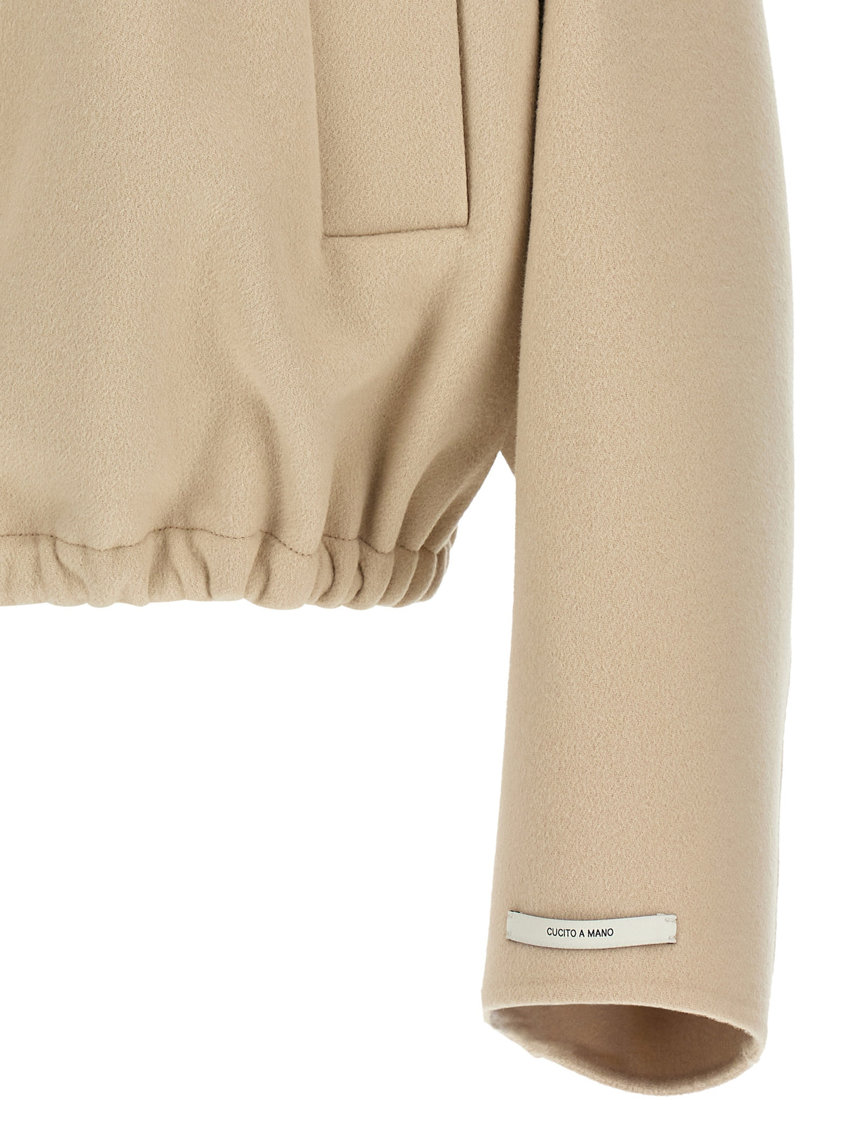 Discover the exquisite Sportmax Beige Wool Bomber, a luxurious blend of pure virgin wool and bold design, perfect for those who embody elegance and sophistication.