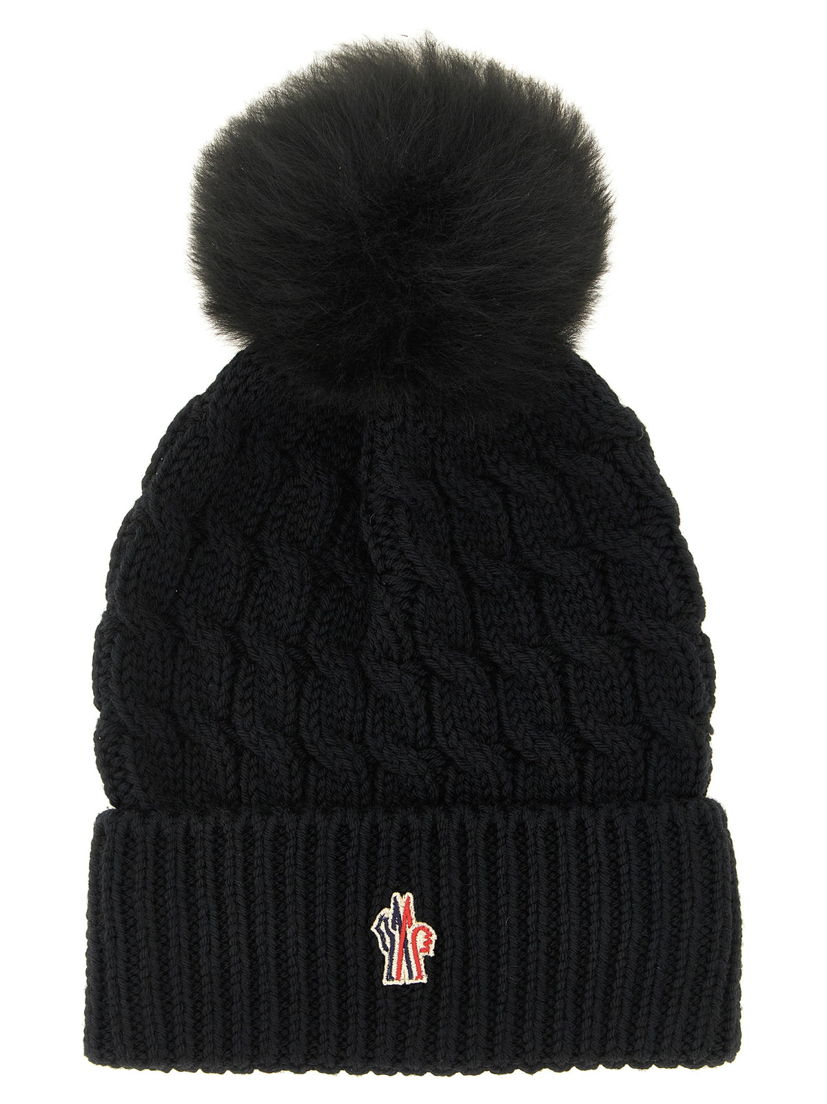 Indulge in the Moncler Grenoble Black Virgin Wool Beanie, a luxurious blend of warmth and elegance, crafted from 100% virgin wool for the discerning individual.