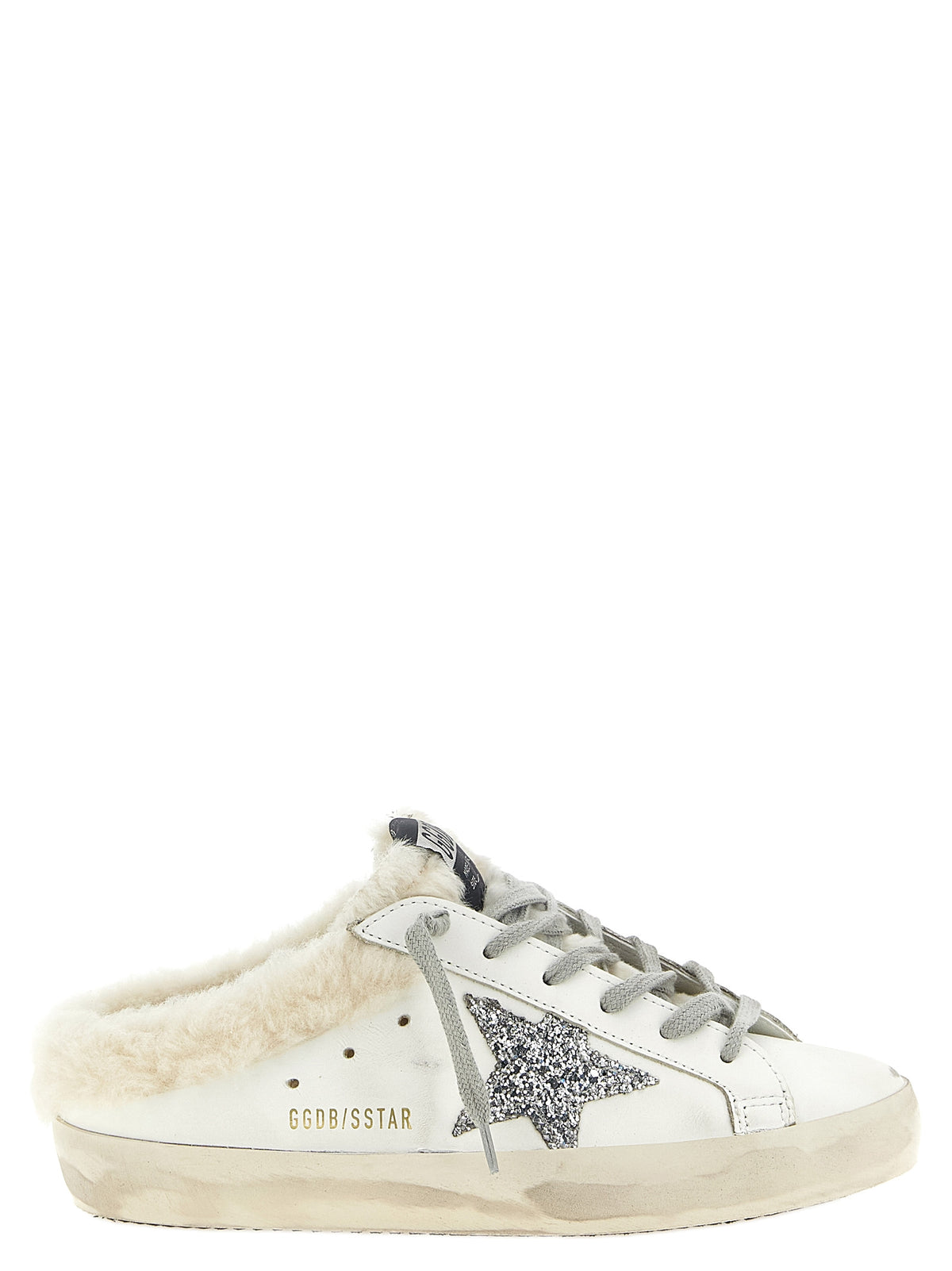 Elevate your style with Golden Goose's White Leather Slides, where luxurious leather meets plush shearling, embodying effortless sophistication for the discerning individual.
