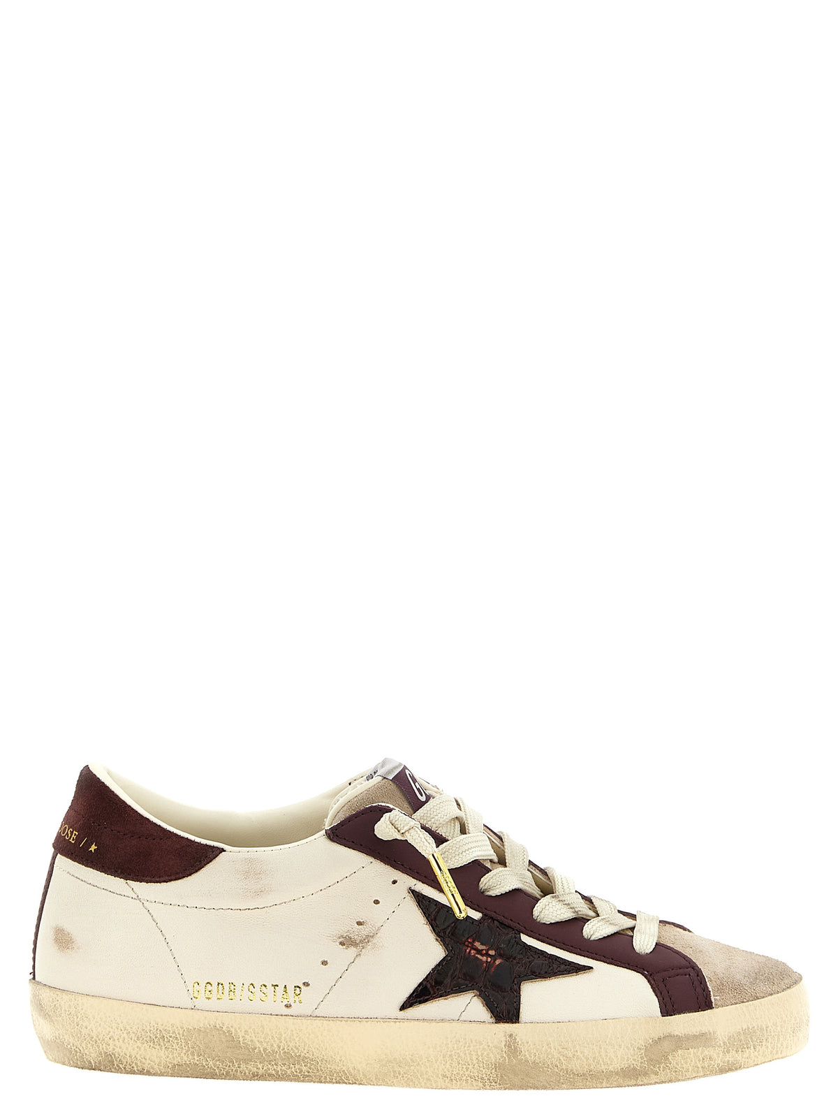 Elevate your style with Golden Goose Bordeaux Leather Low Top Sneakers, a masterpiece of Italian craftsmanship that embodies luxury and urban sophistication.