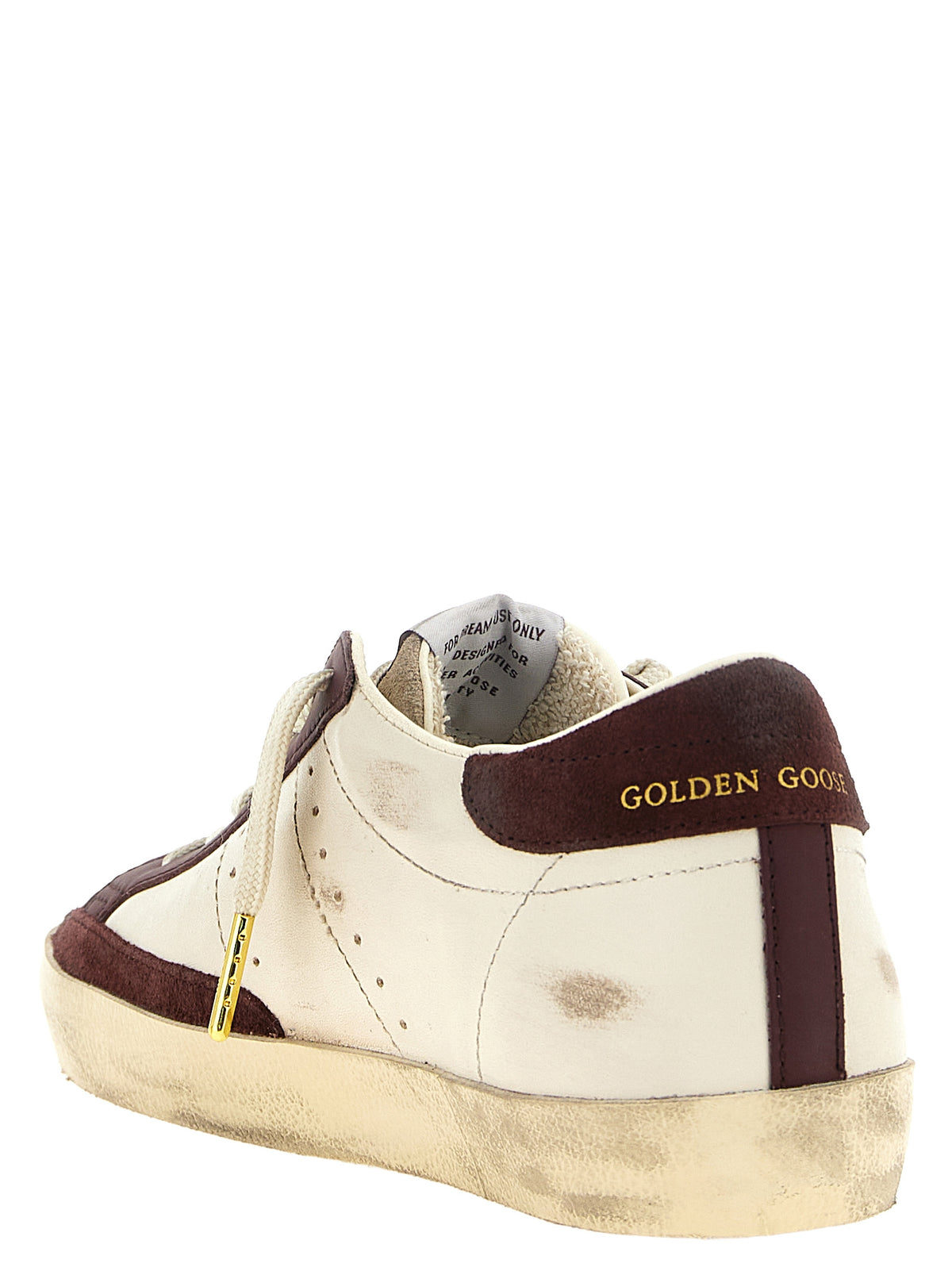 Elevate your style with Golden Goose Bordeaux Leather Low Top Sneakers, where exquisite craftsmanship meets urban elegance in a bold burgundy and cream design.