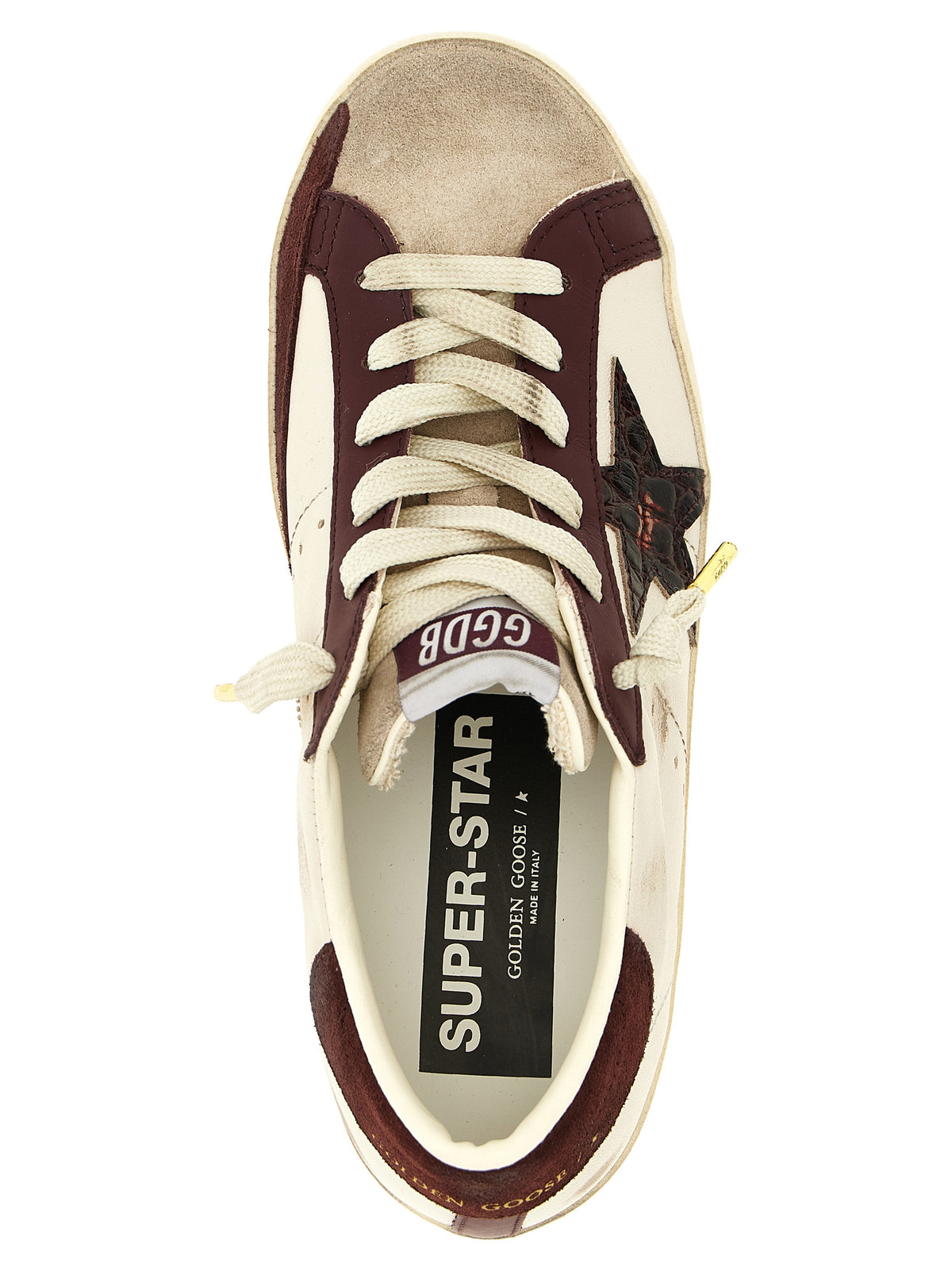 Elevate your style with Golden Goose Bordeaux Leather Low Top Sneakers, where exquisite craftsmanship meets urban elegance in a bold burgundy and cream design.