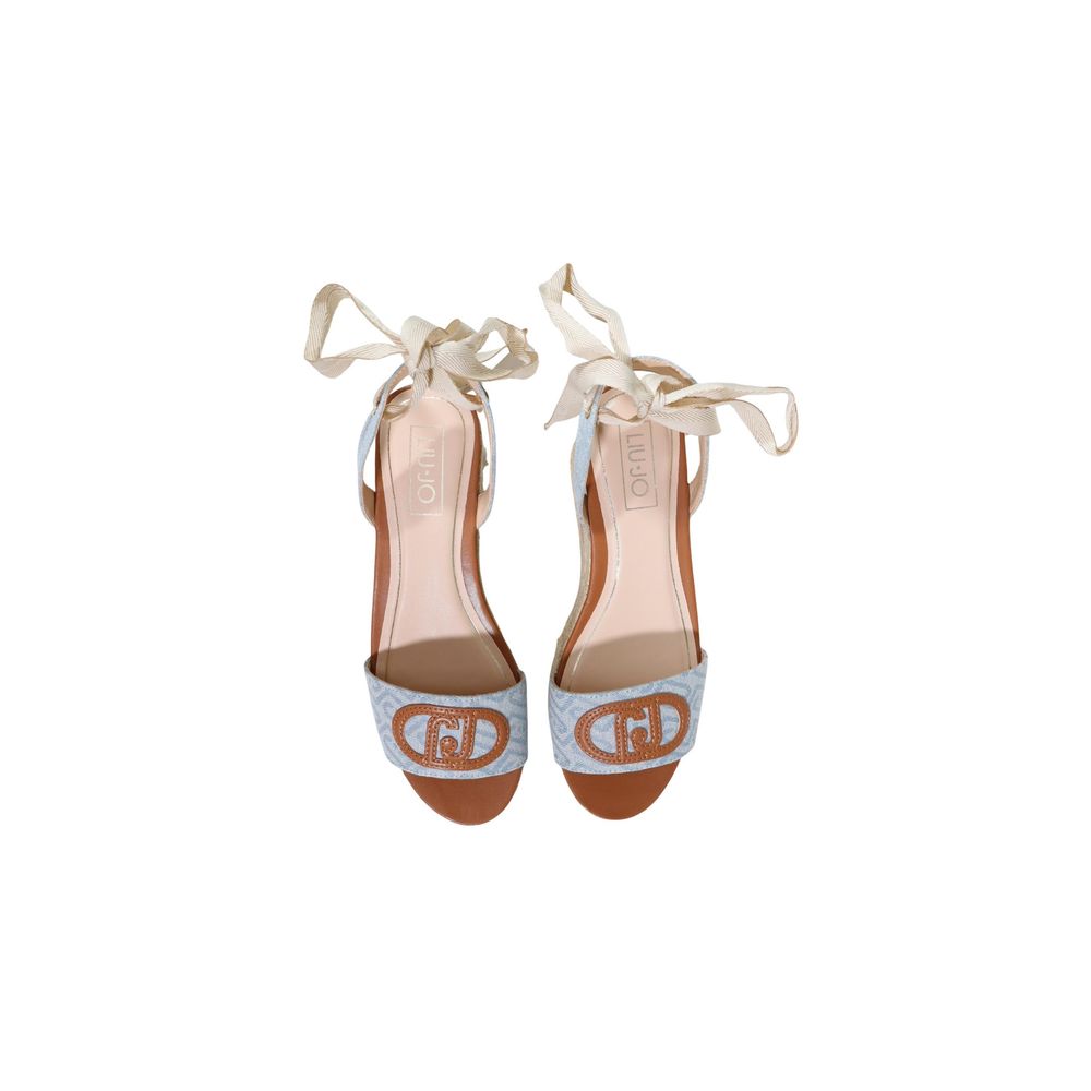 Elevate your summer style with Liu Jo's Light Blue Polyester Wedge Sandals, where sophisticated craftsmanship meets luxurious comfort for the discerning individual.