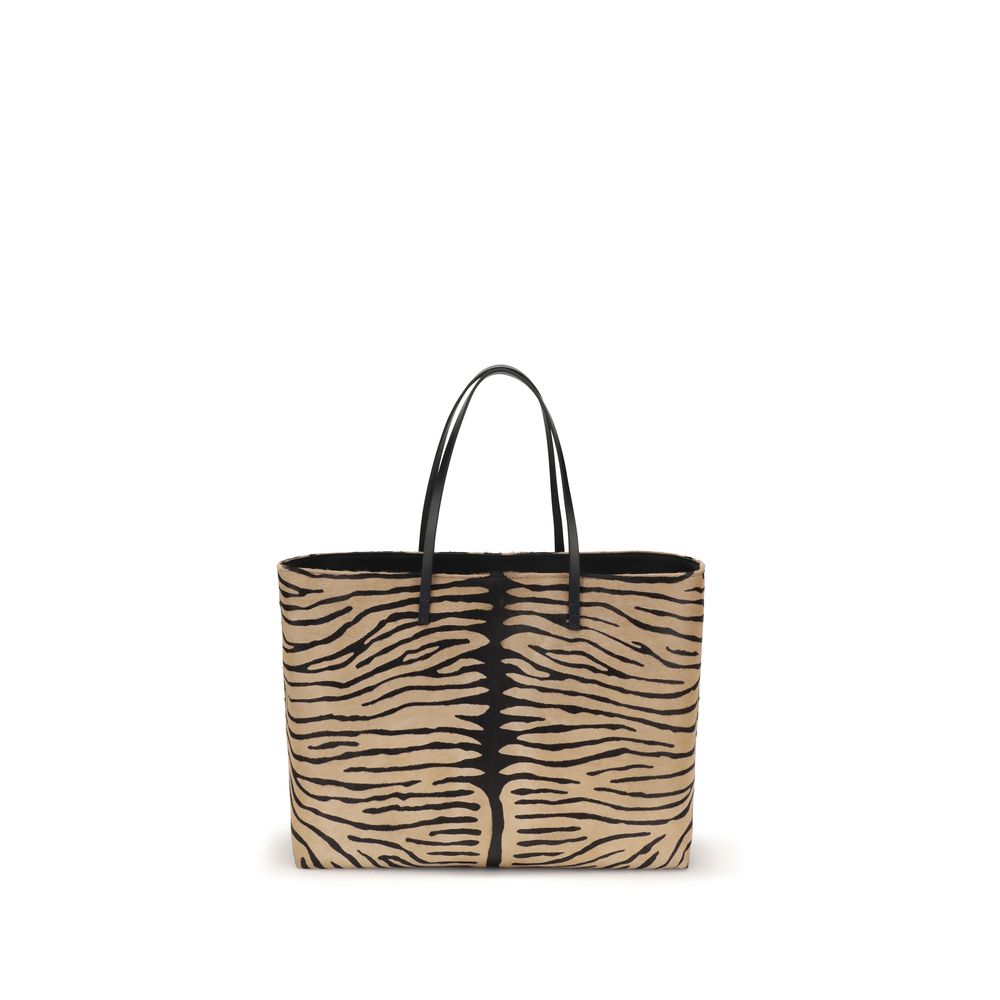 Discover the Fendi Beige Calf Leather Bos Taurus Shoulder Bag, a timeless blend of elegance and functionality, crafted for the discerning individual who appreciates luxury.
