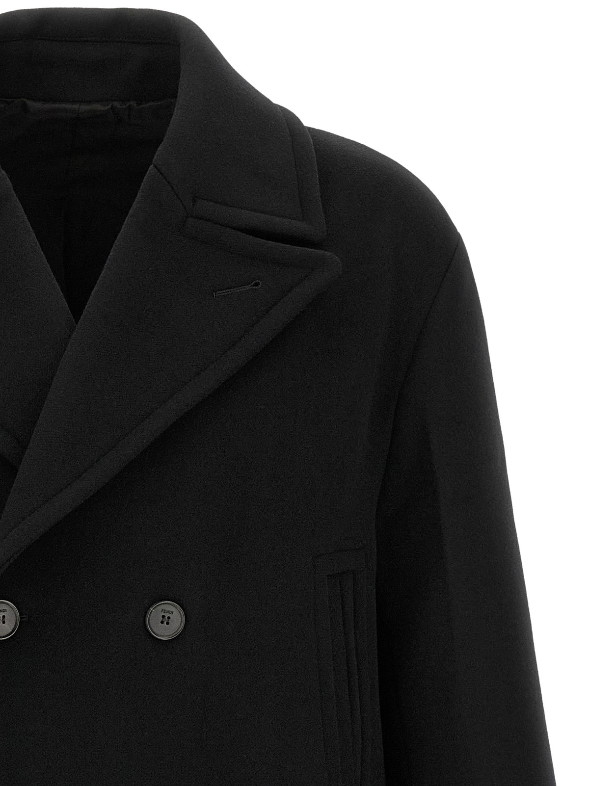 Elevate your wardrobe with the Fendi Black Virgin Wool Coat, a masterpiece of Italian craftsmanship blending luxury and sophistication for the discerning individual.
