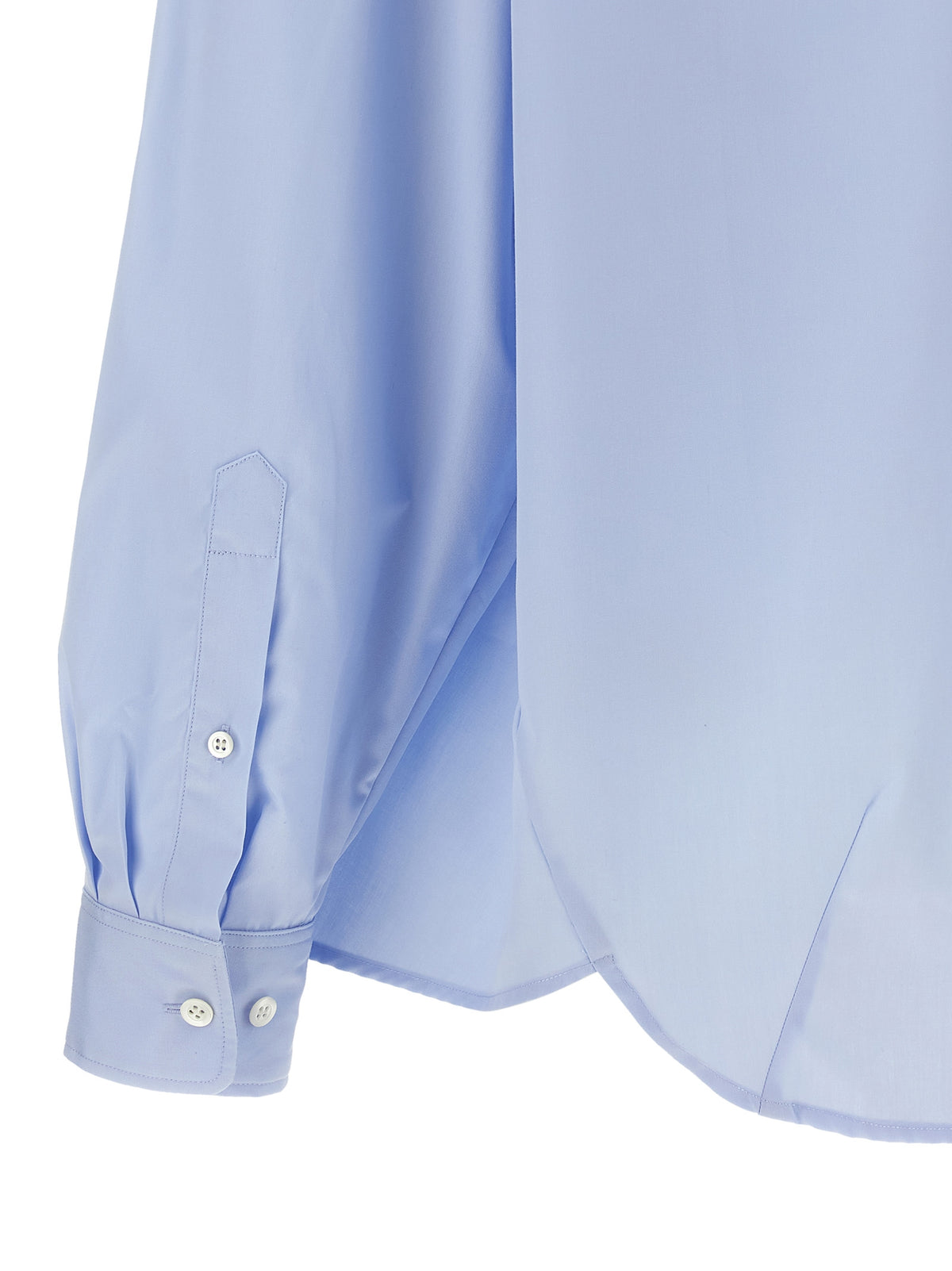 Elevate your wardrobe with the Dries Van Noten Blue Cotton Blouse, a masterpiece of modern tailoring that embodies minimalist elegance and impeccable craftsmanship.