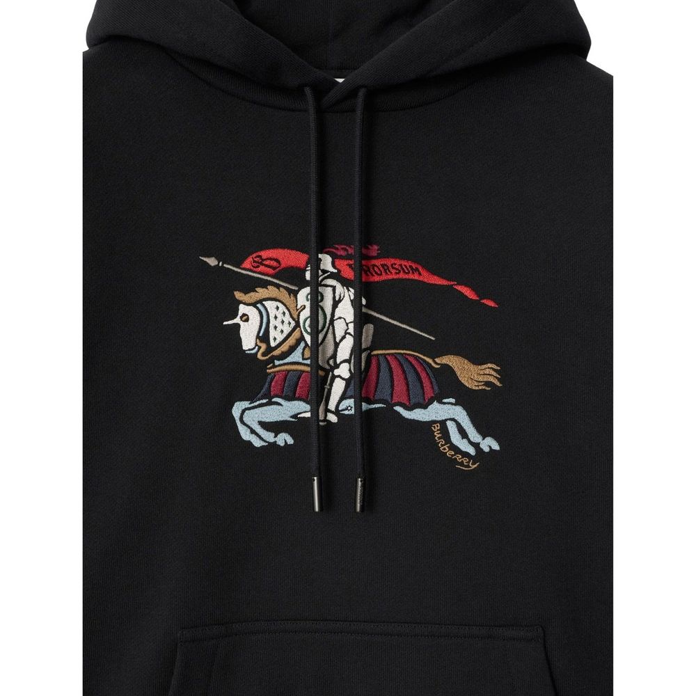 Indulge in the exquisite Burberry Black Cotton Hoodie, a masterpiece of 100% cotton craftsmanship that embodies luxury and sophistication for the discerning individual.