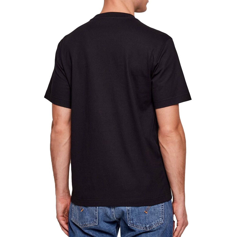 Indulge in the elegance of the Burberry Black Cotton T-Shirt, crafted from 100% cotton in Portugal, embodying sophistication and timeless style for the discerning individual.