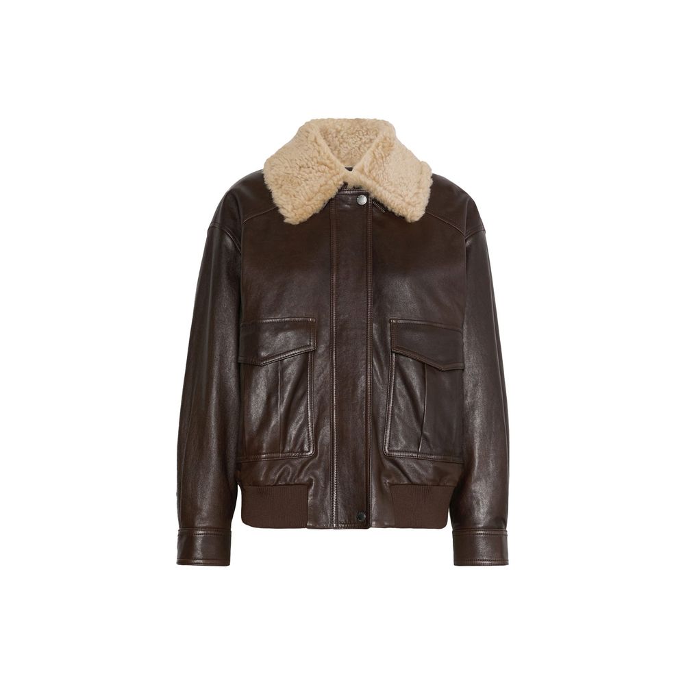 Indulge in the exquisite Max Mara Brown Lamb Leather Bomber, a masterpiece of craftsmanship and luxury, designed for those who appreciate timeless elegance and sophistication.