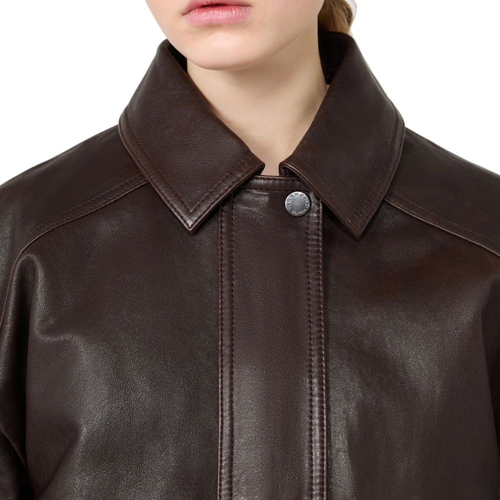 Indulge in the exquisite Max Mara Brown Lamb Leather Bomber, a testament to luxury craftsmanship and timeless elegance, perfect for the discerning individual.