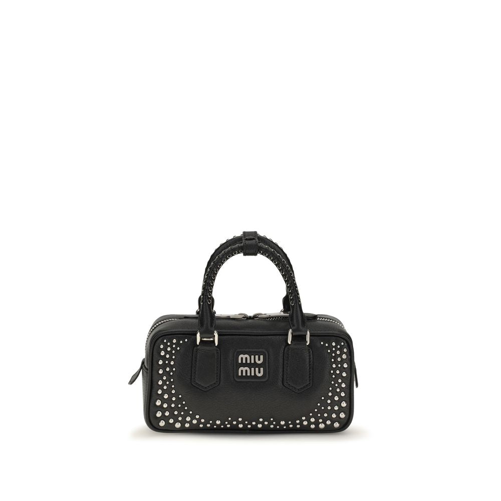 Discover the Miu Miu Black Calf Leather Bos Taurus Shoulder Bag, a masterpiece of exquisite craftsmanship and luxurious design, perfect for the discerning individual.