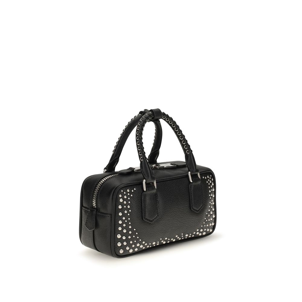 Discover the Miu Miu Black Calf Leather Bos Taurus Shoulder Bag, a masterpiece of exquisite craftsmanship adorned with polished studs, embodying timeless luxury and sophistication.