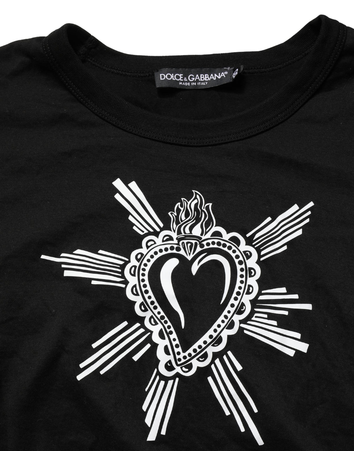 Indulge in the allure of Dolce & Gabbana's Black Sacred Heart Cotton Crew Neck T-shirt, a testament to Italian craftsmanship and timeless elegance, perfect for the discerning individual.