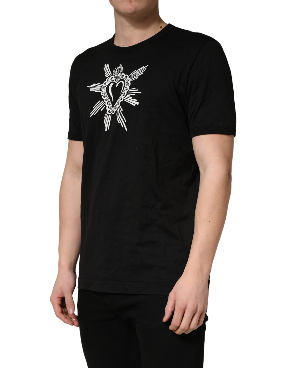 Indulge in the allure of the Dolce & Gabbana Black Sacred Heart Cotton Crew Neck T-shirt, a testament to Italian craftsmanship and timeless elegance, perfect for the discerning individual.