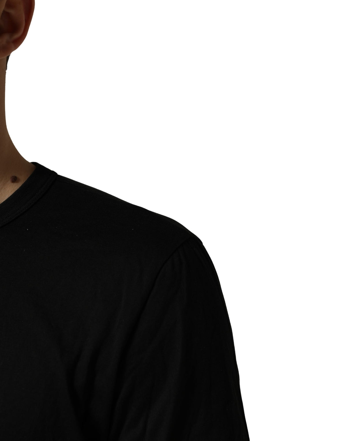 Indulge in the exquisite craftsmanship of Dolce & Gabbana's Black Sacred Heart Cotton Crew Neck T-shirt, a timeless piece that embodies luxury and sophistication.