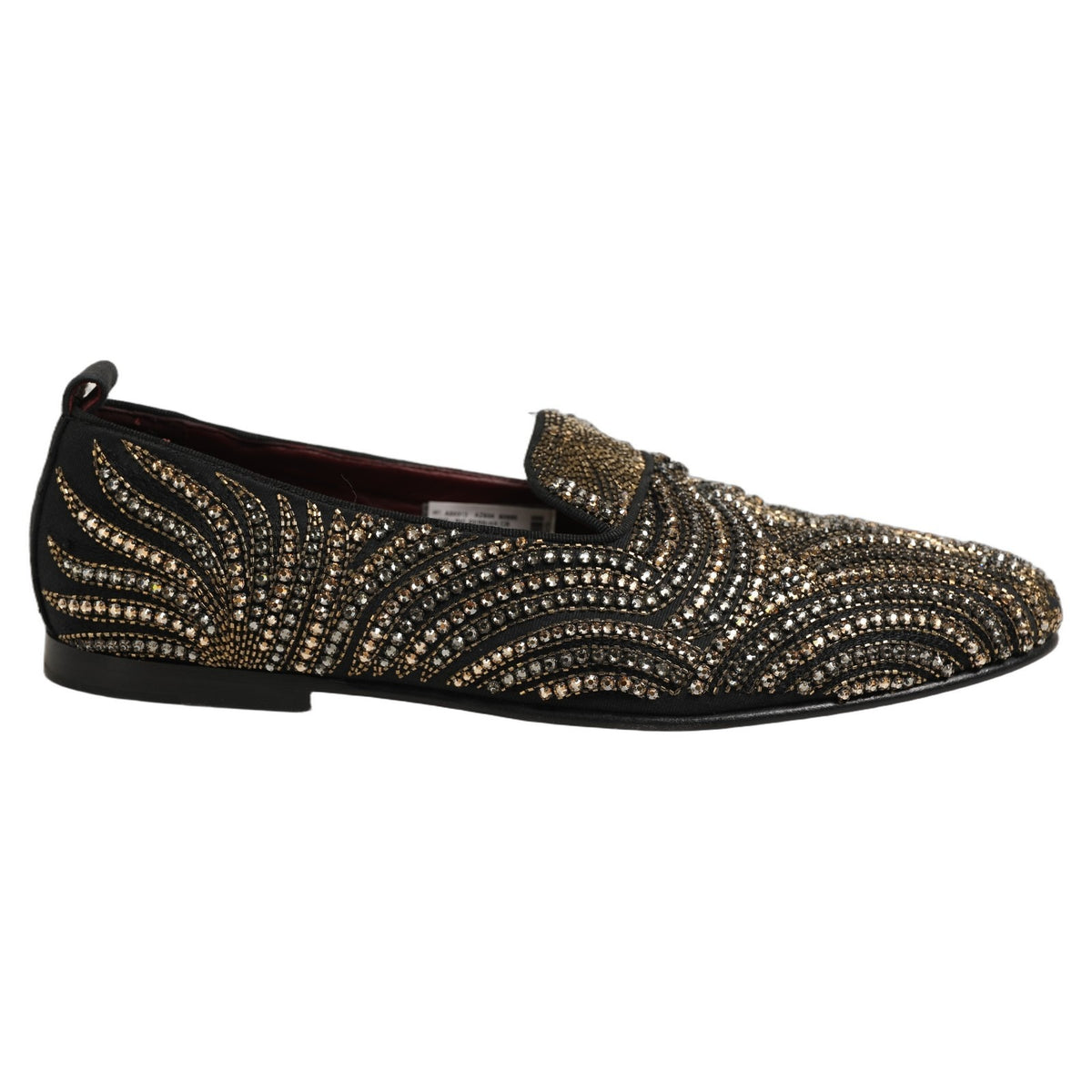 Indulge in the exquisite Dolce & Gabbana Black Gold Embellished Slippers, a masterpiece of Italian craftsmanship that elevates your style with luxurious allure.