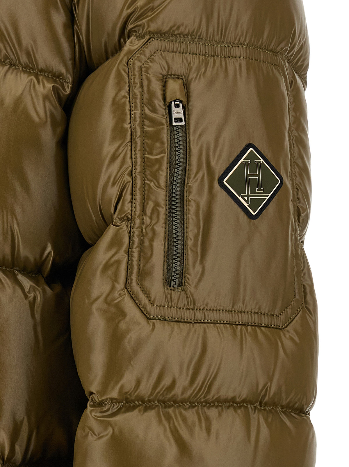 Elevate your winter wardrobe with the Herno Bicolor Polyamide Full-Length Jacket, a masterpiece of design and comfort, crafted from high-performance materials for the discerning individual.