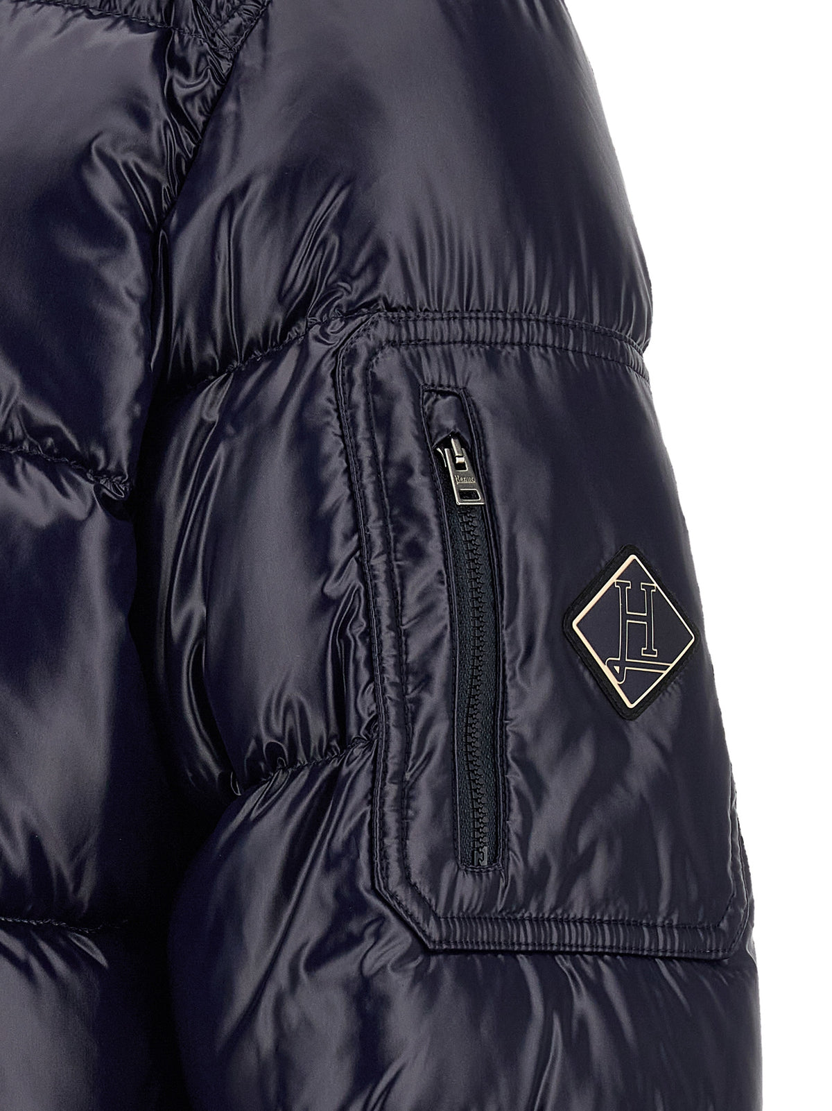 Elevate your winter wardrobe with Herno's Blue Polyamide Full-Length Jacket, a fusion of urban sophistication and warmth, crafted for the discerning individual.