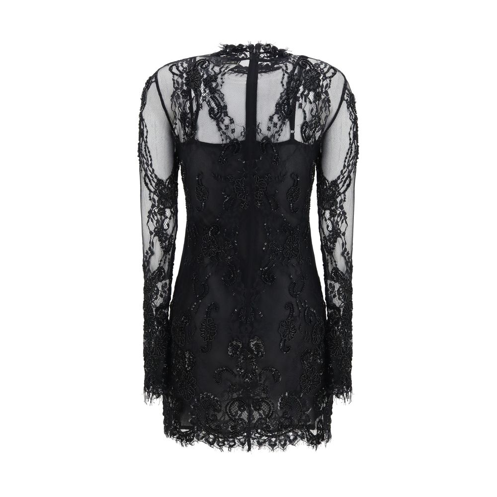 Experience the allure of the Blumarine Black Polyamide Cocktail Dress, a masterpiece of intricate lace and exquisite embroidery, perfect for those who embody elegance and sophistication.
