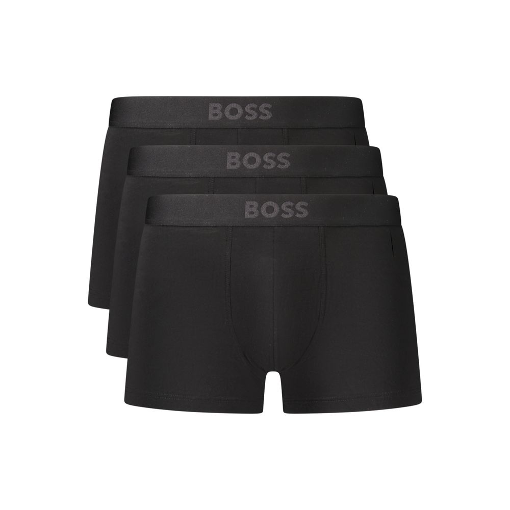 Indulge in the exquisite allure of Hugo Boss Black Cotton Boxers, a tri-pack embodying elegance and comfort, perfect for those who appreciate refined luxury.