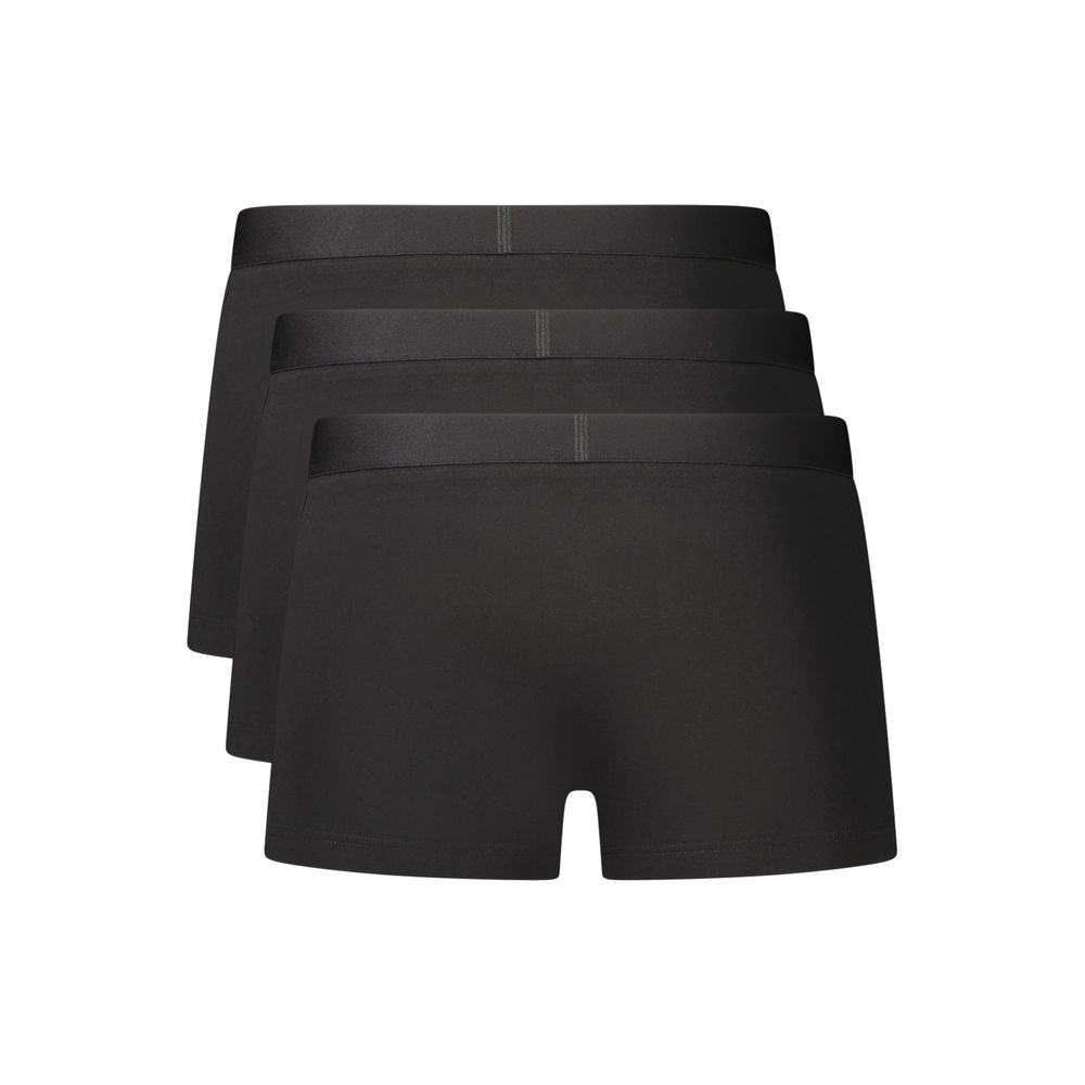 Indulge in the elegance of Hugo Boss Black Cotton Boxers, a tri-pack designed for the discerning individual who values comfort and sophistication in every detail.