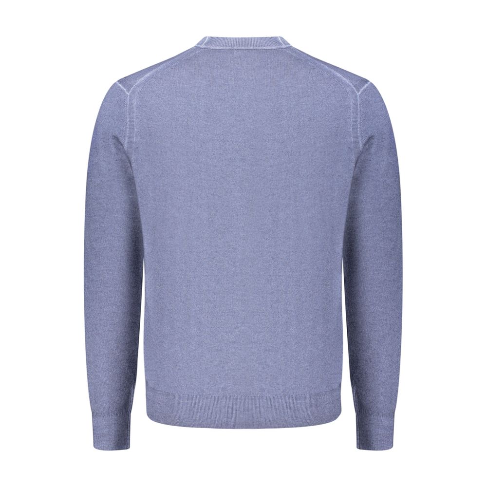 Indulge in the elegance of the Hugo Boss Blue Wool Sweatshirt, a testament to refined craftsmanship and timeless style, perfect for the discerning individual.