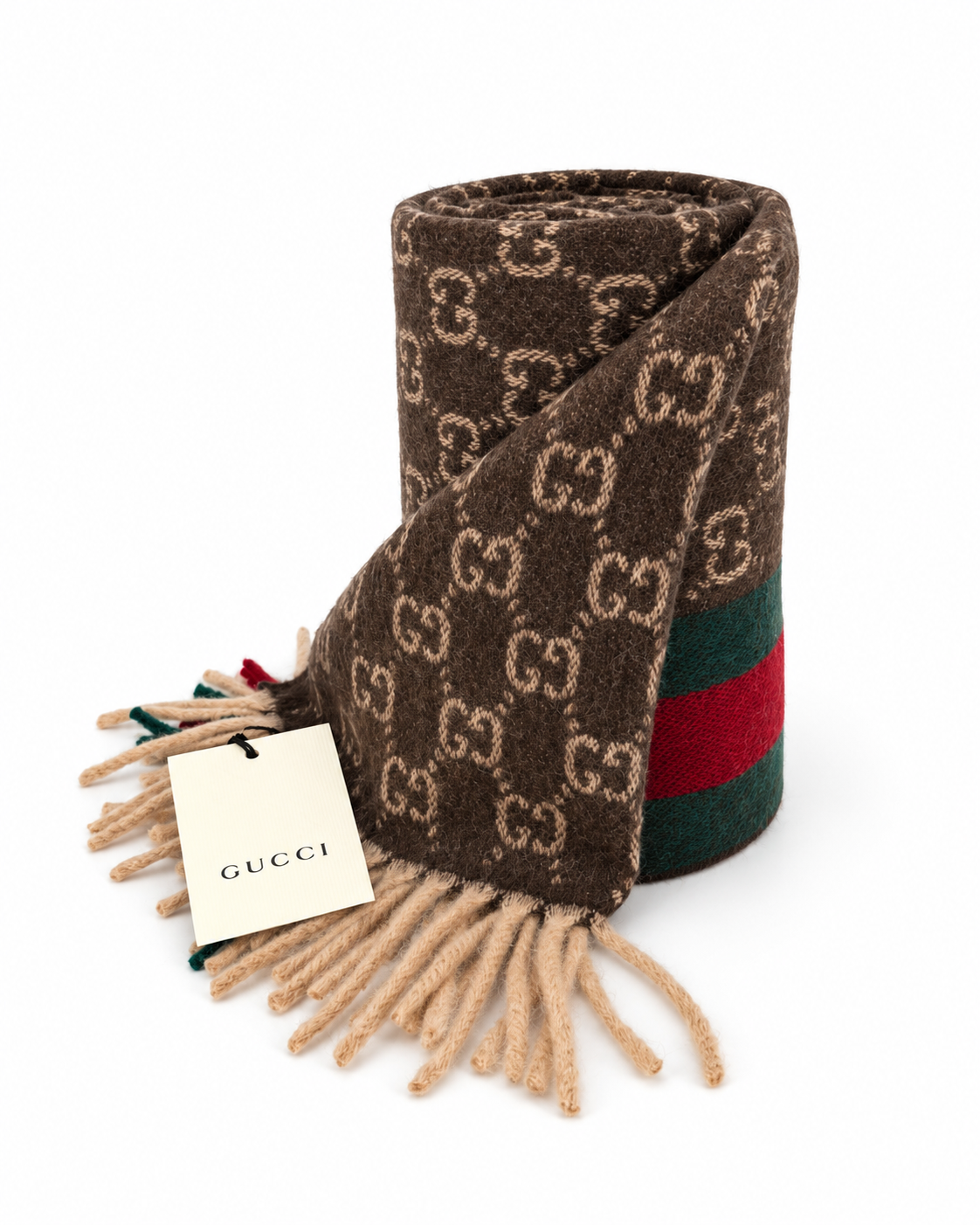 Indulge in the elegance of the Gucci Monogram Brown Cashmere & Wool Scarf, a timeless accessory blending luxurious materials with iconic design, perfect for the discerning individual.