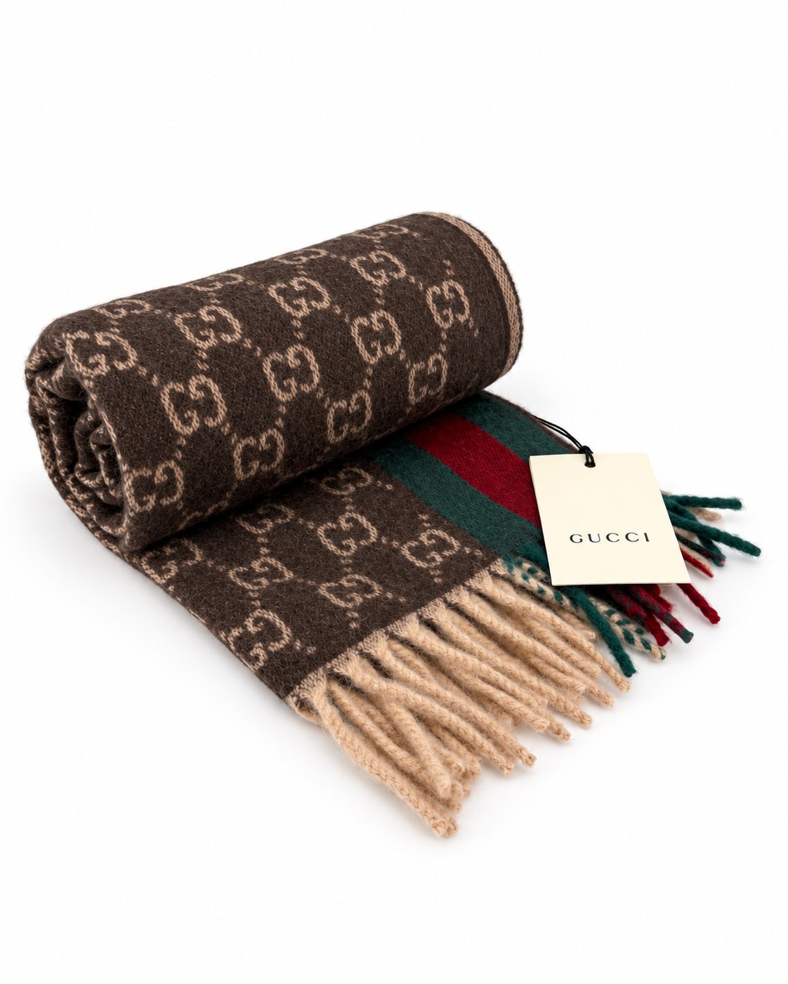 Indulge in the elegance of the Gucci Monogram Brown Cashmere & Wool Scarf, a luxurious blend of sophistication and warmth, perfect for the discerning individual.