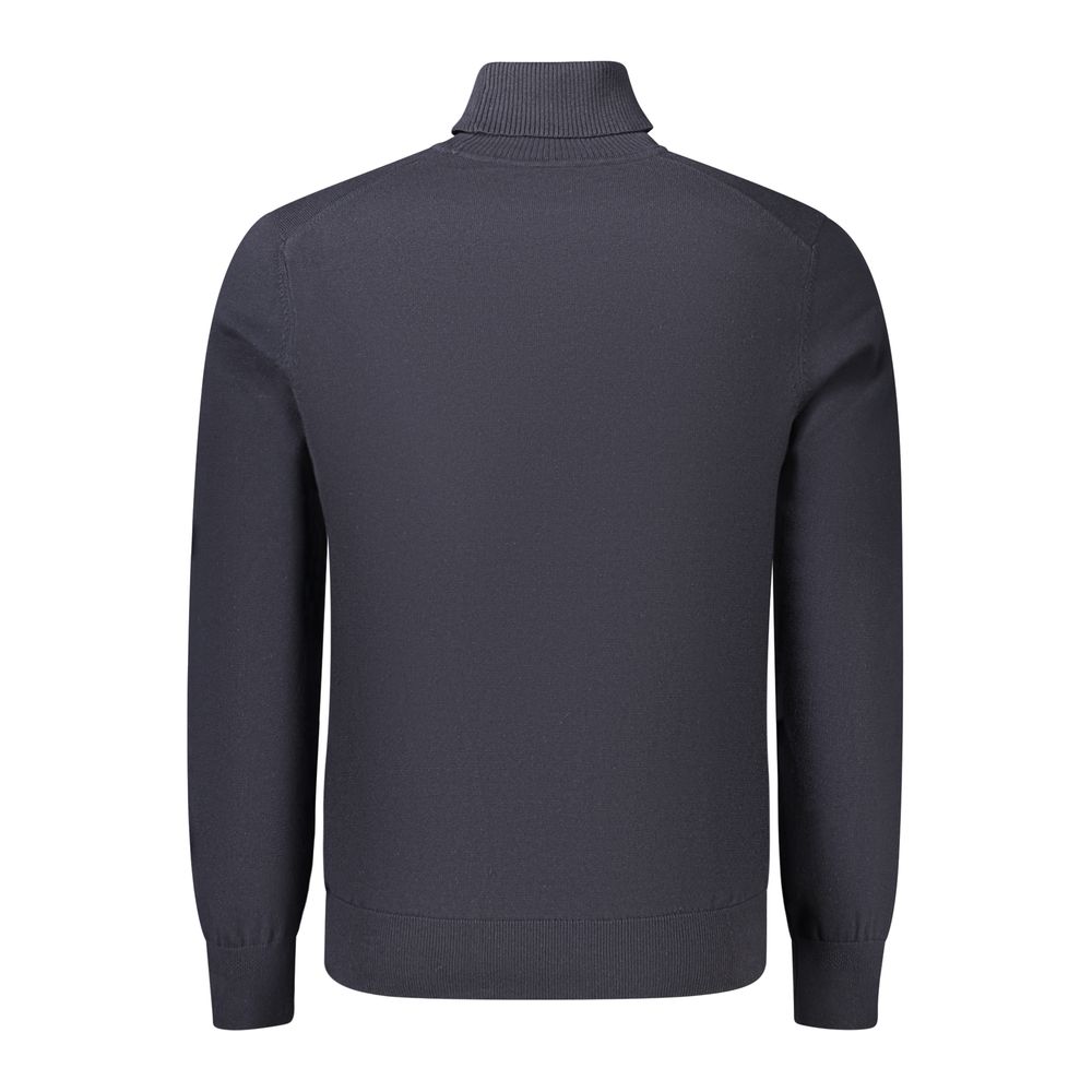 Indulge in the exquisite elegance of the Hugo Boss Blue Cotton Turtleneck, a timeless piece that embodies luxury and sophistication for the discerning individual.