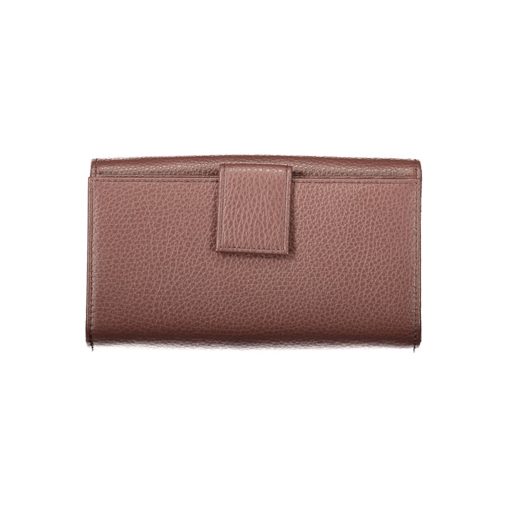 Indulge in the exquisite Coccinelle Brown Leather Wallet, a masterpiece of craftsmanship featuring a sleek design and luxurious functionality, perfect for the discerning individual.