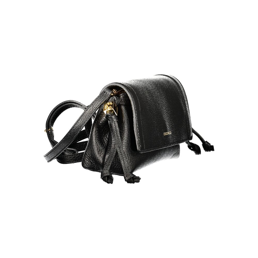 Indulge in the elegance of the Coccinelle Black Leather Handbag, where exquisite craftsmanship meets timeless design, perfect for the discerning individual.