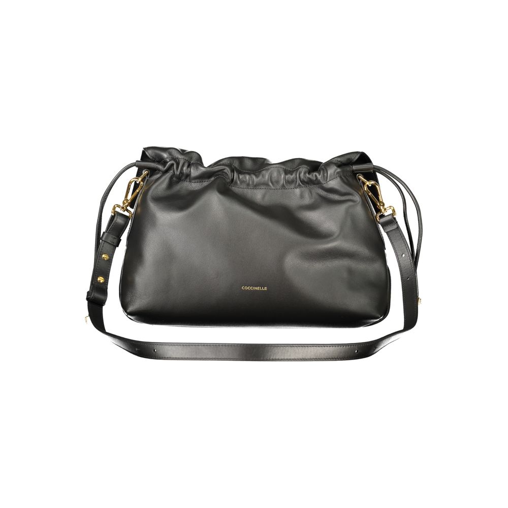 Indulge in the elegance of the Coccinelle Black Leather Handbag, a masterpiece of design featuring a drawstring closure and luxurious interior, perfect for the discerning individual.