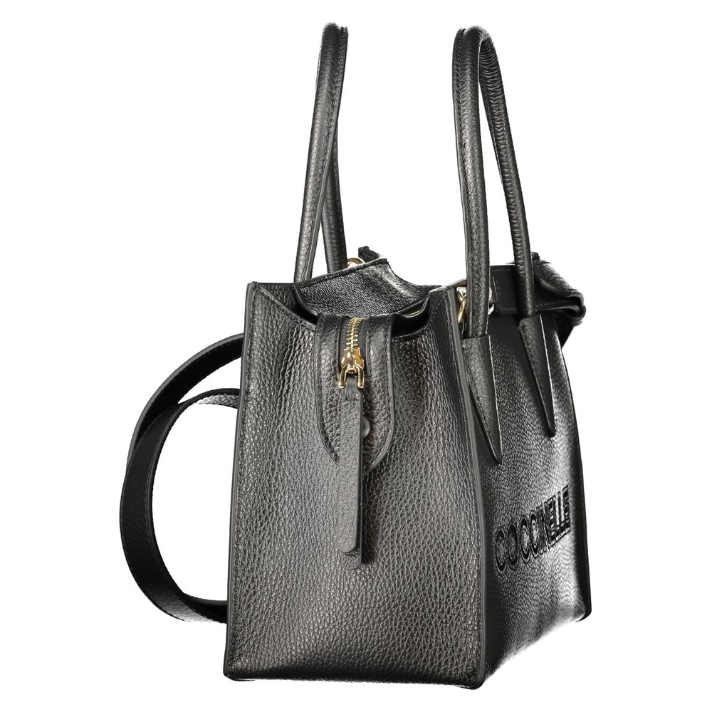 Indulge in the elegance of the Coccinelle Black Leather Handbag, a statement of sophistication with exquisite craftsmanship and timeless allure for the discerning individual.