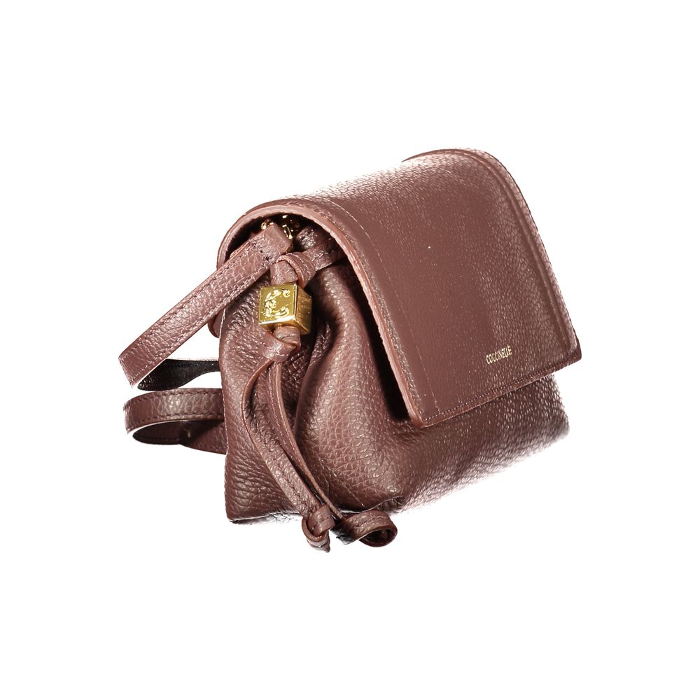 Discover the Coccinelle Brown Leather Handbag, a masterpiece of exquisite craftsmanship and timeless elegance, perfect for those who embody sophistication and allure.