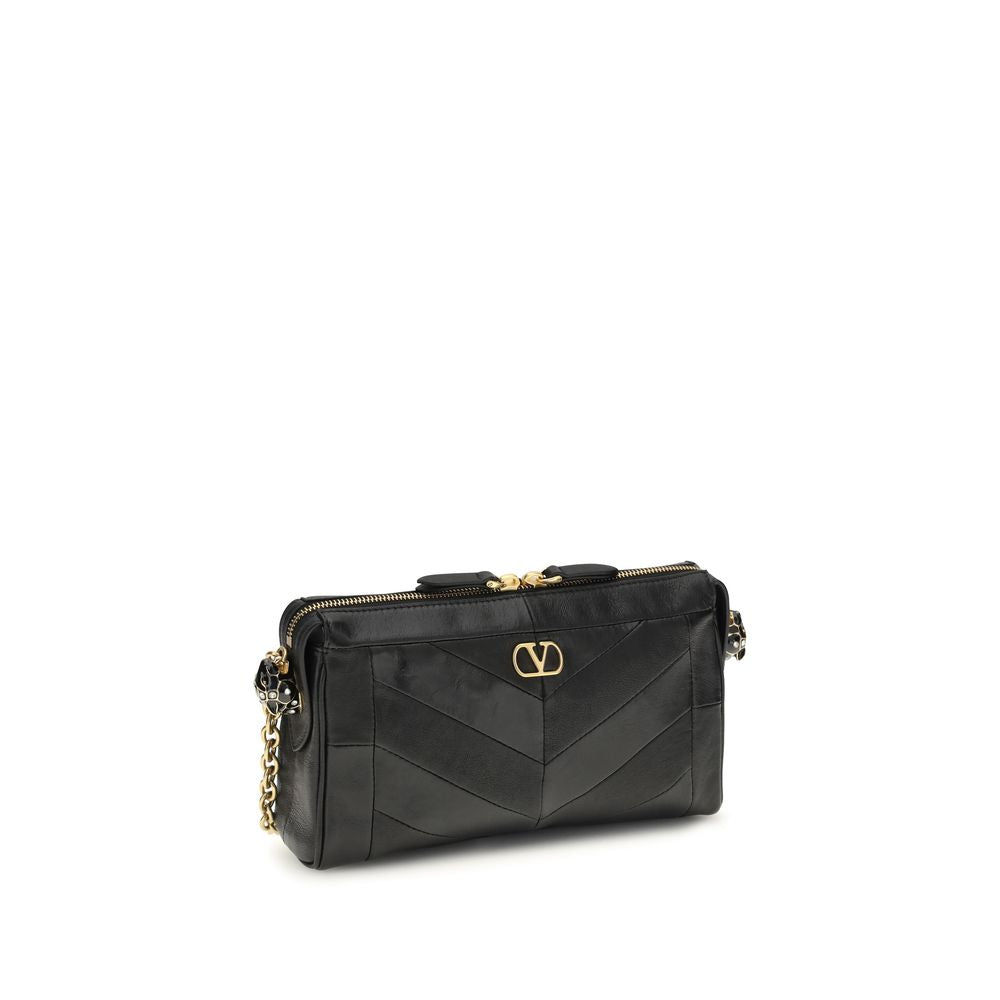 Indulge in the exquisite craftsmanship of the Valentino Garavani Panthea Chevron Shoulder Bag, a luxurious blend of glossy and matte nappa leather, perfect for the discerning connoisseur.