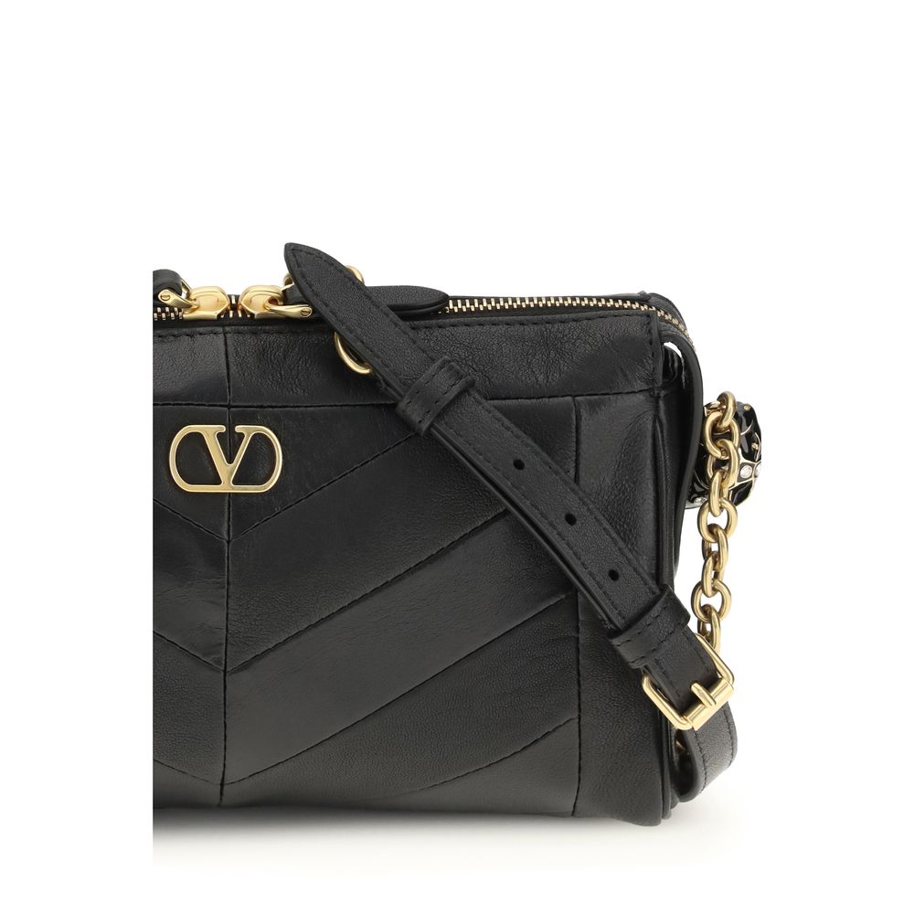 Indulge in the exquisite allure of the Valentino Garavani Panthea Chevron Shoulder Bag, where luxurious nappa leather meets artisanal craftsmanship, embodying timeless elegance.