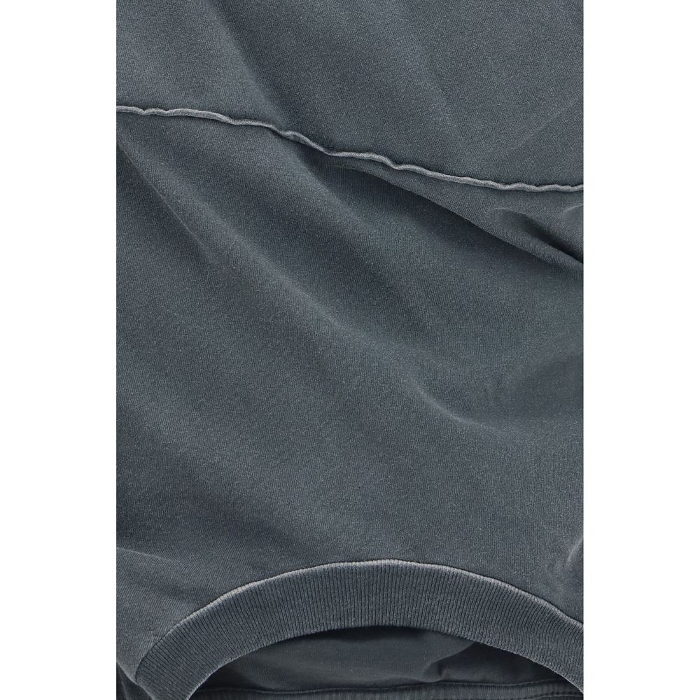 Discover the Maison Margiela Gray Cotton Blouse, a masterpiece of draped elegance and contemporary design, perfect for those who embrace luxury and individuality.