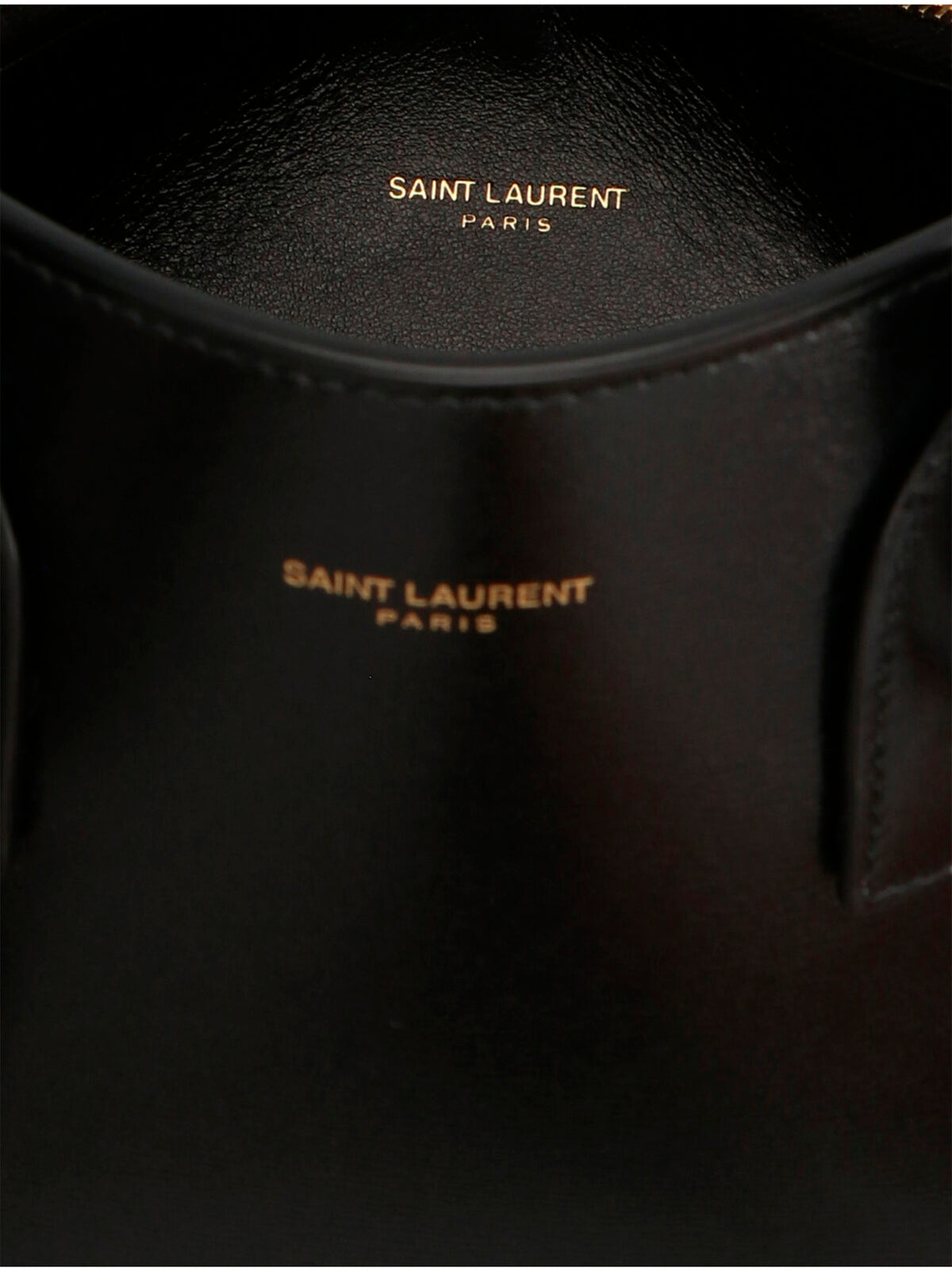 Indulge in the timeless elegance of the Saint Laurent Black Calfskin Handbag, a masterpiece of Italian craftsmanship that elevates your style with luxurious sophistication.