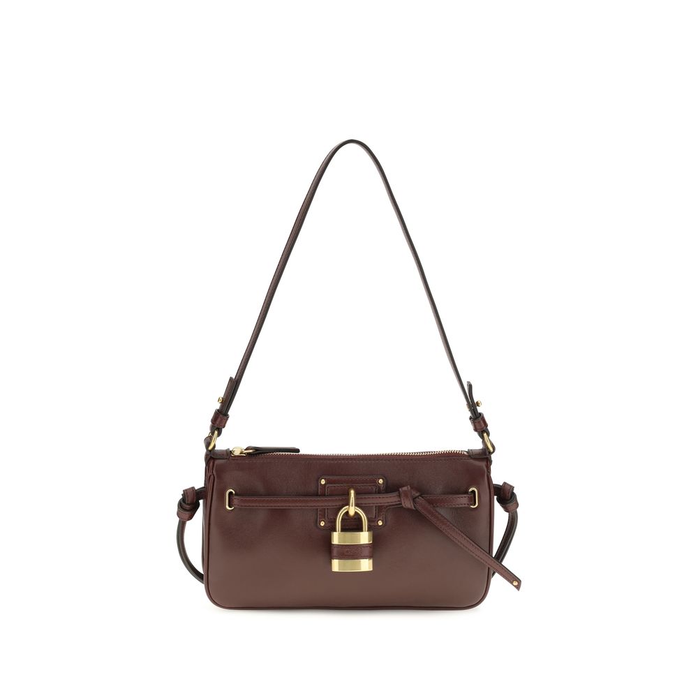 Discover the Chloé Bordeaux Calf Leather Bos Taurus Shoulder Bag, a blend of exquisite craftsmanship and iconic design, perfect for those who embody elegance and sophistication.