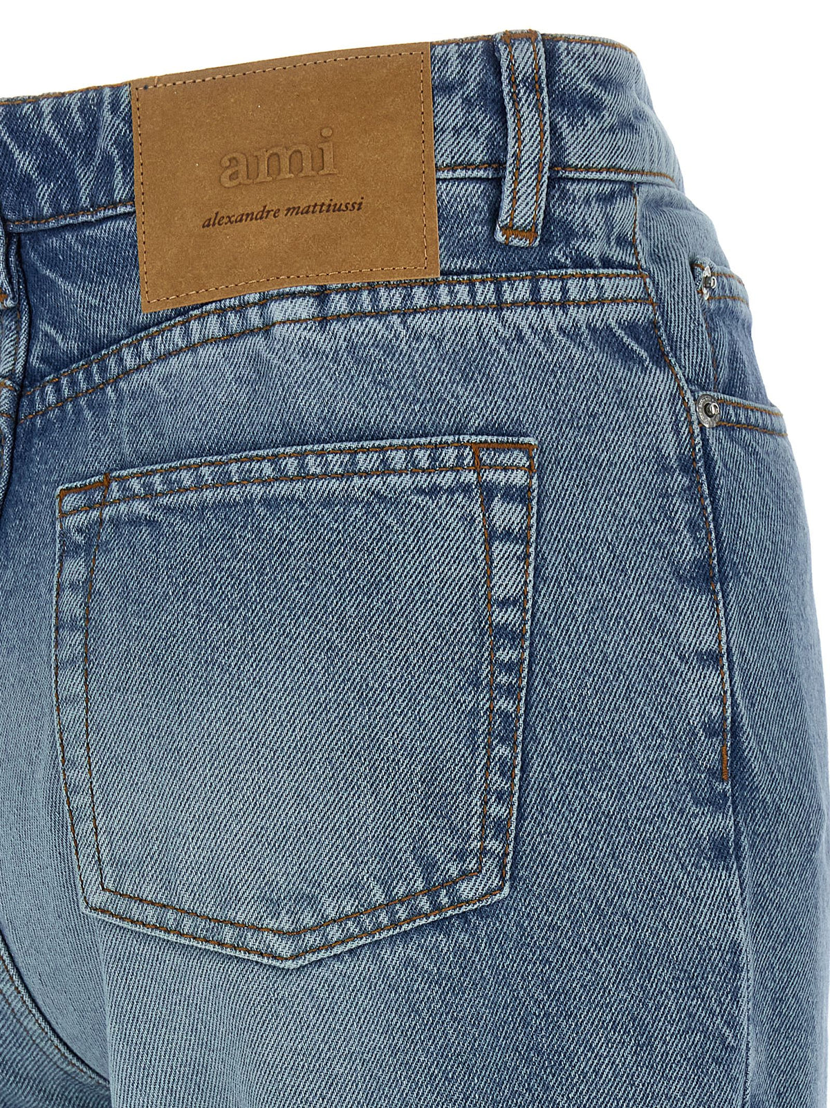 Indulge in the allure of AMI PARIS Blue Cotton Flared Jeans, where exquisite craftsmanship meets a bold, flattering silhouette, elevating your denim collection to new heights.