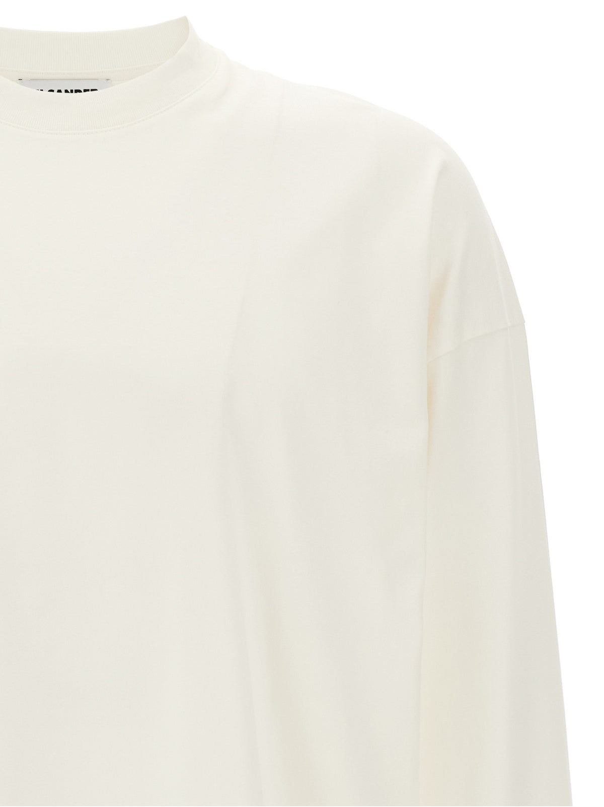 Indulge in the refined elegance of the Jil Sander White Cotton T-Shirt, where luxurious craftsmanship meets modern sophistication, perfect for the discerning trendsetter.