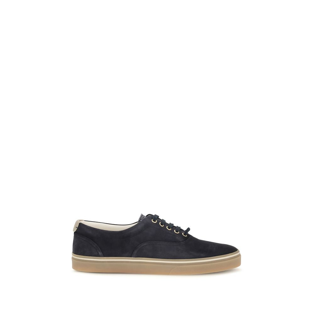 Discover the exquisite Brunello Cucinelli Blue Suede Leather Low Top Sneakers, where luxurious craftsmanship meets timeless elegance, perfect for the discerning individual.