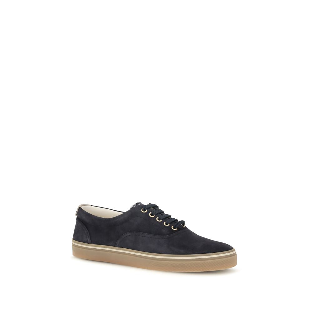 Experience the exquisite craftsmanship of Brunello Cucinelli's Blue Suede Leather Low Top Sneakers, where luxurious materials meet timeless elegance for the discerning individual.