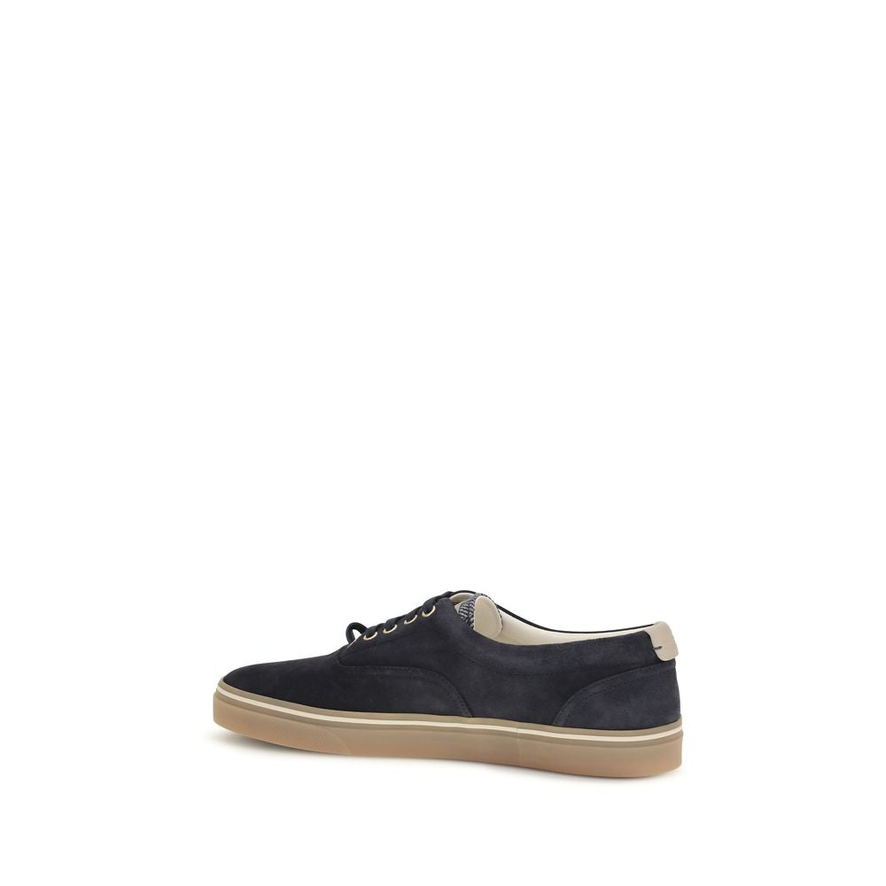 Indulge in the exquisite Brunello Cucinelli Blue Suede Leather Low Top Sneakers, where fine craftsmanship meets luxurious design, elevating your style with every step.