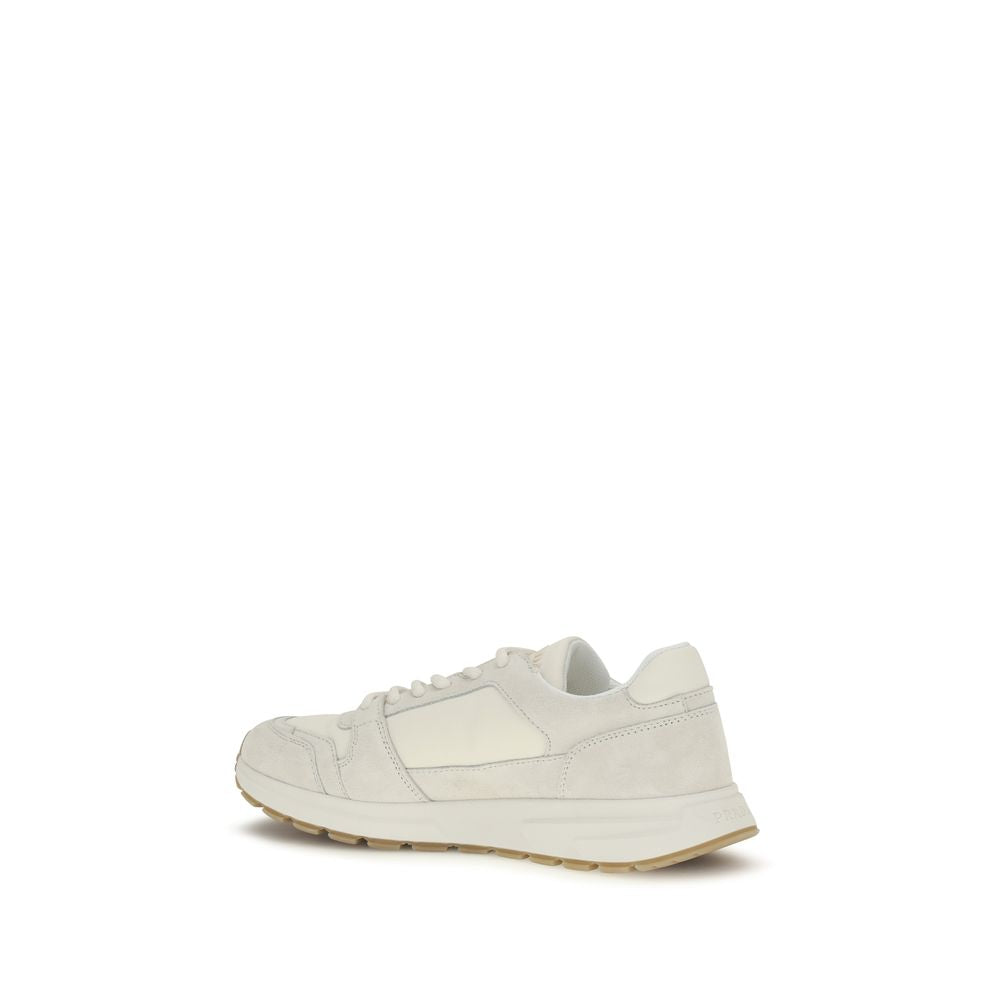 Elevate your style with Prada's Beige Calf Leather Bos Taurus Athletic Sneakers, where exquisite craftsmanship meets sporty elegance for the discerning individual.