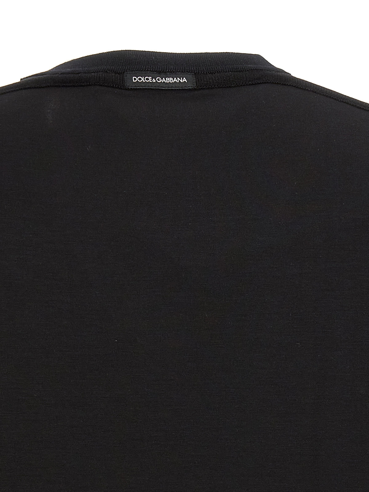 Elevate your wardrobe with the Dolce & Gabbana Black Viscose T-Shirt, a masterpiece of Italian craftsmanship blending luxury and comfort for the discerning individual.