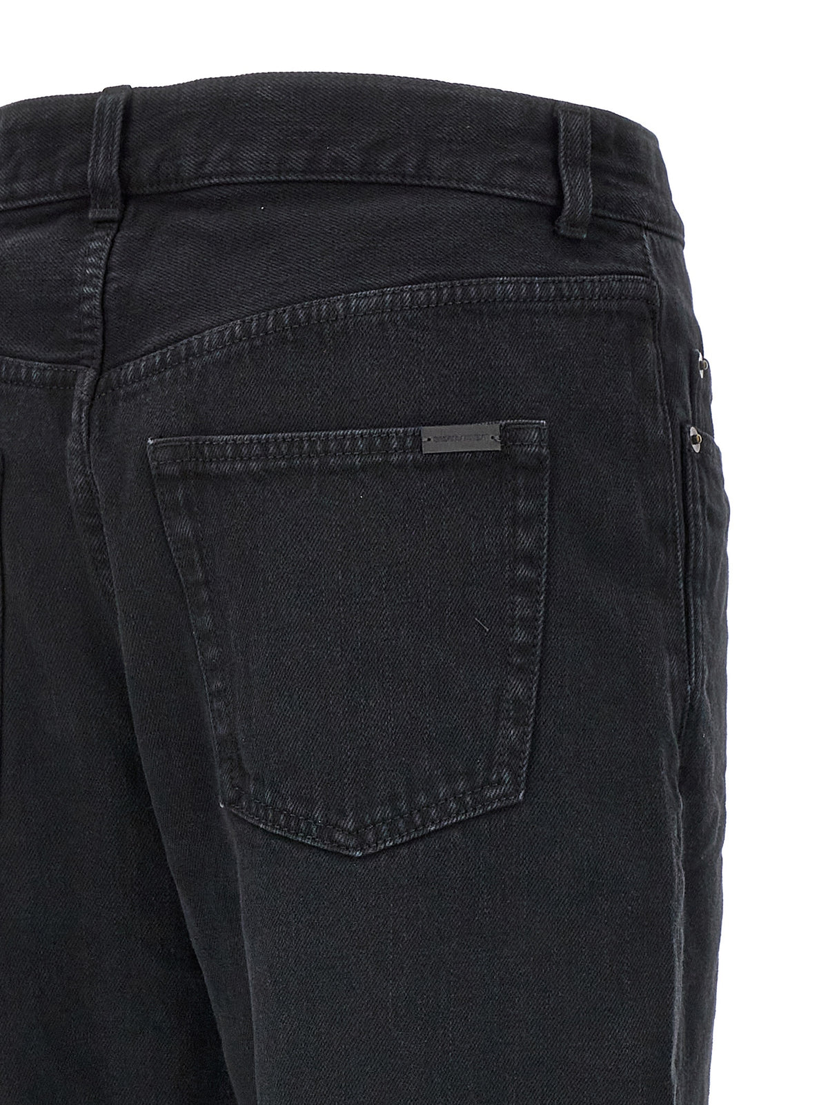 Discover the exquisite craftsmanship of Saint Laurent's black cotton straight-leg jeans, a timeless staple that embodies luxury and sophistication for the discerning wardrobe.