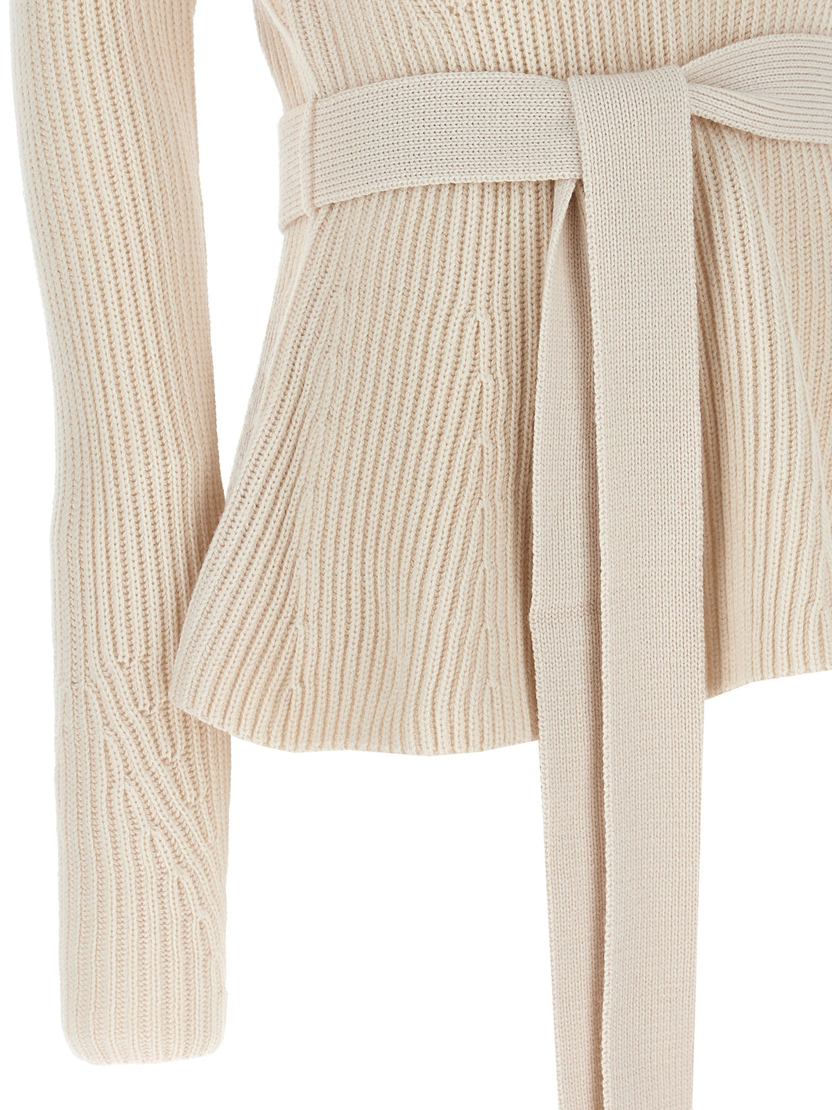 Elevate your winter wardrobe with the Zimmermann Beige Merino Wool Cardigan, a luxurious blend of sophistication and comfort, perfect for the discerning individual.